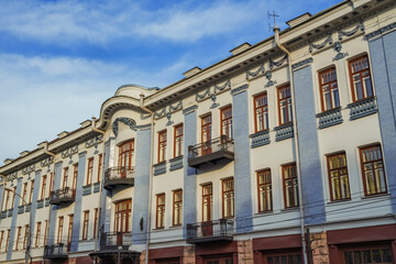 Obraz premium Historic architectural facade of a building with balconies in Irkutsk during autumn season. Irkutsk city, historical building.