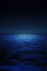 Obraz premium A tranquil scene of deep blue water reflecting soft light, evoking a sense of calm and serenity.