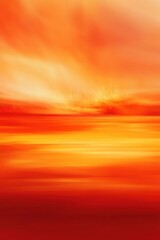 Fototapeta premium An abstract sunset scene with vibrant orange and red hues, creating a warm and serene ambiance.