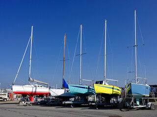 Fototapeta premium Boats on trailers at La Turballe, a commune in the Loire-Atlantique department in western France.