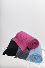 Soft and vibrant cotton towels in various colors (pink, gray, blue, black) perfect for bathroom, spa, or gym use. Absorbent and durable, ideal for daily use and easy care