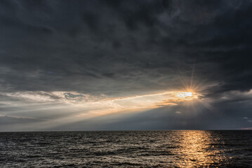 Cloudy Sky over the Baltic Sea in Latvia. Europe. Beautiful Evening Sunlight ever the Water.