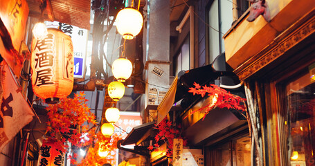 Night, lights and market in city of japan on vacation for shopping, travel destination and...