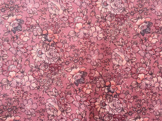 delicate oriental pink spun fabric featuring intricate floral designs, blending elegance with a...