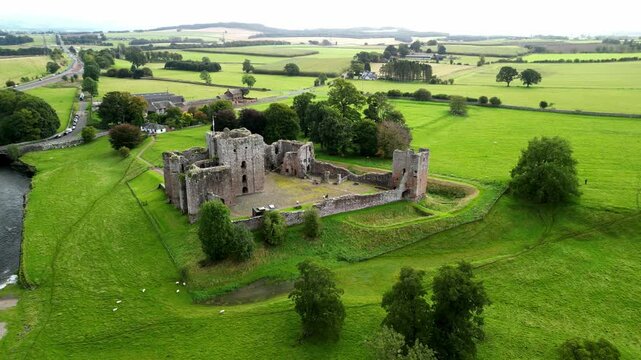 The Brougham Castle and the Yorkshire Dales National Park in the background Cumbria, England. Aerial footage.