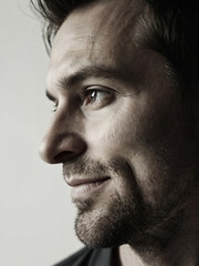 Fototapeta premium A monochrome, blurred portrait emphasizing light and texture.