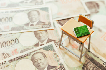勉強机とお金　入学金や奨学金　学費や授業料のイメージ写真素材