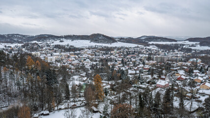 snow covered town. town Ceska kamenice, Czech republic.