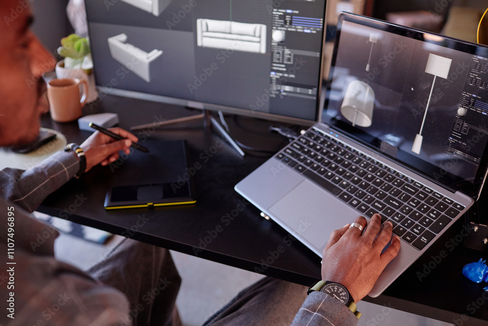 Leinwandbilder designer is focusing on creating detailed interior models on laptop while using graphic tablet and m