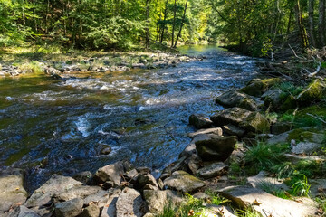 Hiking along ILZ River near Diessenstein in the Bavarian Forests Germany.