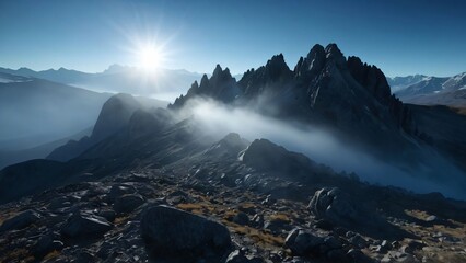 A rocky mountain landscape under a bright blue sky