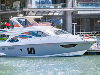 Obraz premium boat stay in port with modern office building