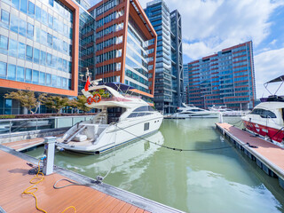 boat stay in port with modern office building