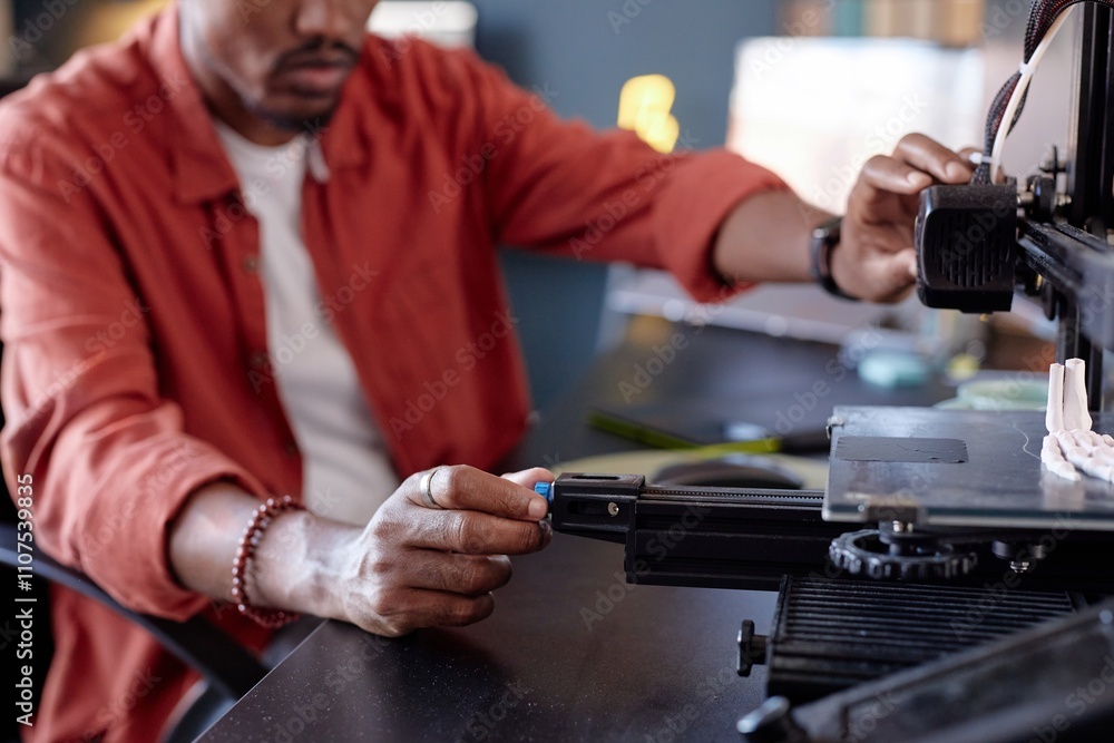 Poster person operating advanced 3d printer in a modern workspace, focusing on the machine's settings. deta