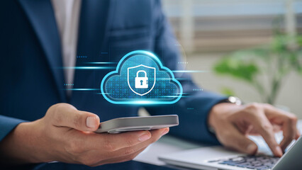 Cloud Computing and Mobile Data Security. Businessman using a smartphone with a secure cloud...