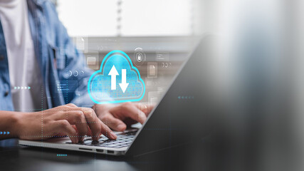 Cloud Computing for Data Synchronization. Person using laptop with Cloud Data Upload and Download,...