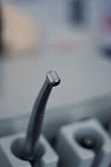 Close-up view of a dental tool in a clinic setting