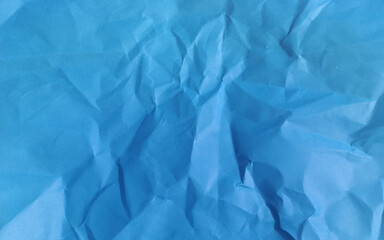 Obraz premium Crumpled poster or wrinkled texture paper illustration vector. Realistic blue crumpled paper texture.