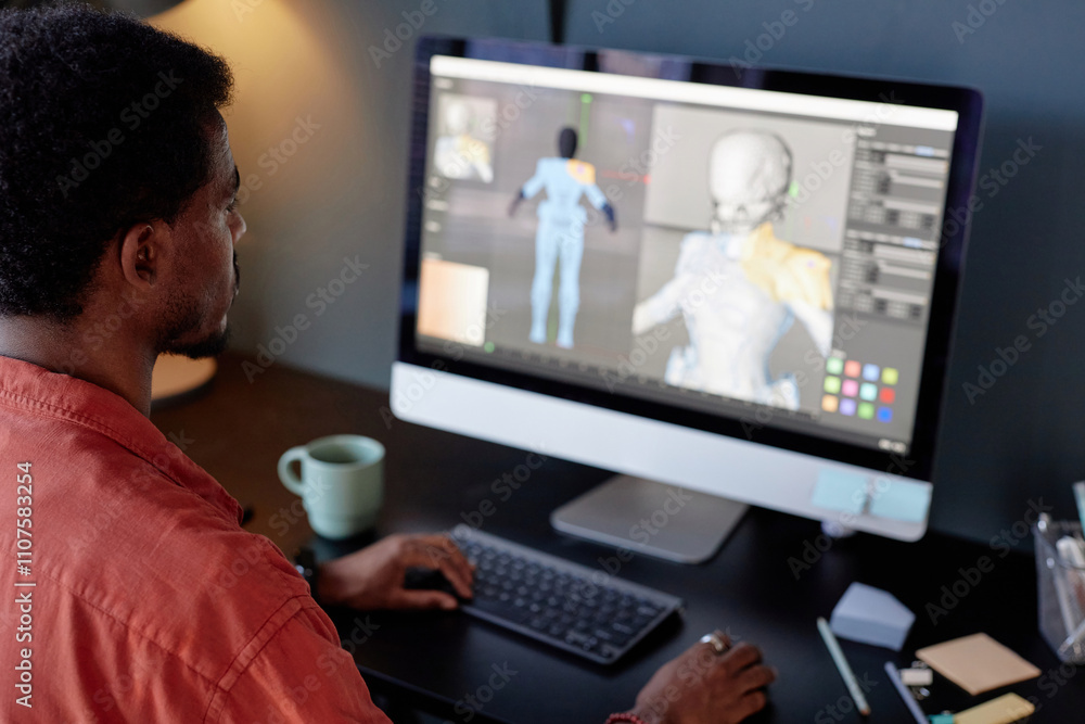 Aufkleber Individual sitting at desk while handling a 3D modeling project on computer monitor. Background features various design tools on the screen and desk accessories