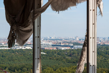 Old abandoned radio station teufelsberg in Berlin with the view of the Berlin City.