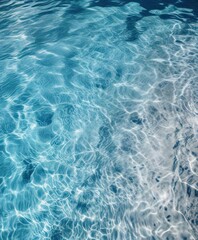Obraz premium Blue sparkling swimming pool water with ripples, texture, reflection