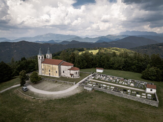 Aerial view of Marijino Celje church near Gorenja vas, Soca valley, Slovenia