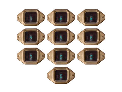 A luminescent old-fashioned indicator with a golden frame shows the numbers 0 to 9, is isolated.