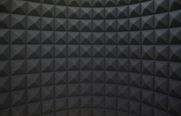Recording studio cabin background with black acoustic foam for soundproofing