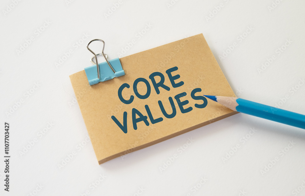Poster paper business card with text core values , closeup isolated over white background