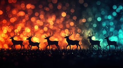 Fototapeta premium Silhouetted reindeer walk across a bokeh background of warm and cool colors.