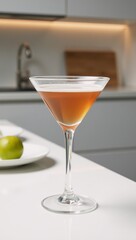 A crystal-clear martini glass on an isolated tabletop evokes a stylish caf or home setting for kitchenware