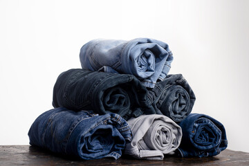 Jeans pants pairs. Denim pants background. Denim sales. Jeans fabric texture. Jeans trousers pants....