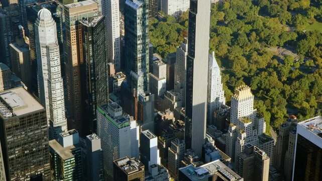 Amazing Panoramic Aerial View of Billionaires Row in 57th and 59th street Midtown Manhattan. Supertall Skyscrapers. Central Park. High Quality Content Shot from Helicopter.