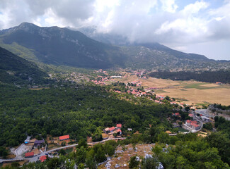 Fototapeta premium Montenegro. Mountain landscape and village in the valley.