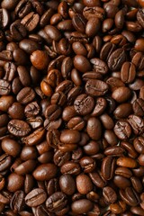 Fototapeta premium Coffee beans background, close up 