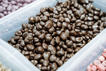 This delightful container is filled to the brim with delicious chocolatecovered nuts, making it a...
