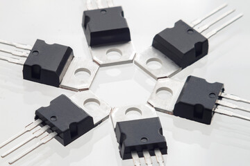 Plastic transistor, model 7812 voltage regulator encapsulated TO220, isolated on white background