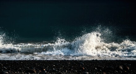 Majestic ocean wave crashing on pebble beach