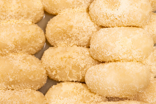 White ChumChum or ChumChum laddo texture closeup top view of indian, pakistani and bangladeshi sweets dessert