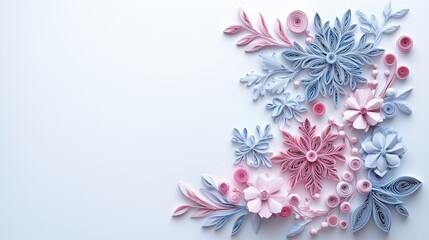 Quilled snowflakes in pastel color tone on a white background with space for text, quilled snowflakes and foliage in pastel color arranged in a corner design on a white background.