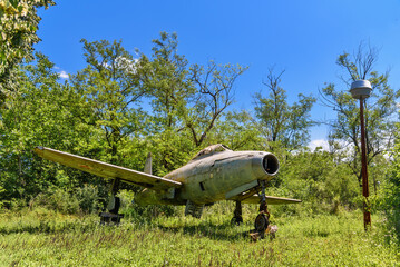 Old aircraft close up on grass