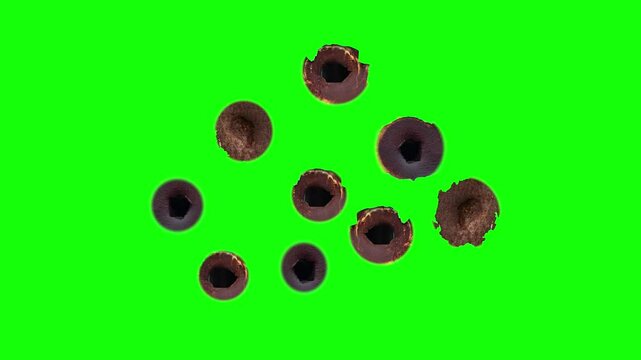 Gunshot holes on metal is isolated on green screen