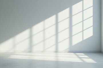 Obraz premium Empty room with window sunlight casting shadows on wall and floor