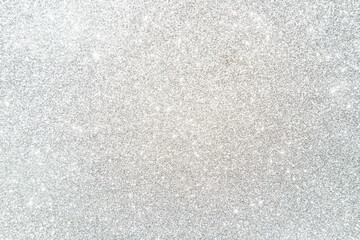 Silver glittering bokeh effect background