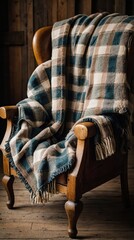 Fototapeta premium Cozy blanket on the chair, old chair