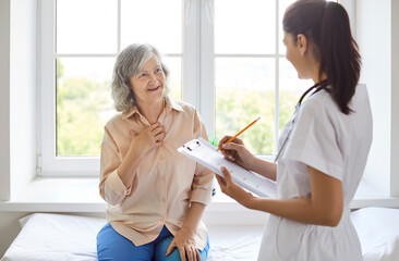 Kind senior care, professional doctor, young nurse, physician consulting old female patient,...