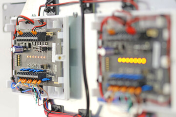 Security and fire alarm system. Connection by mounting wires. Close-up. Soft focus.