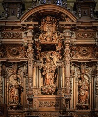 Details of a wooden sculpture of the Virgin Mary with the baby Jesus, interior of the Cathedral of the Incarnation, Malaga, Spain