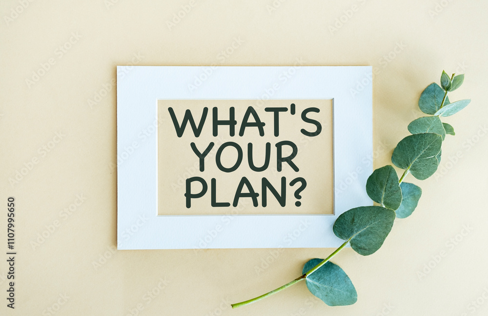 Poster what's your plan text on white notepad with envelope on yellow background.