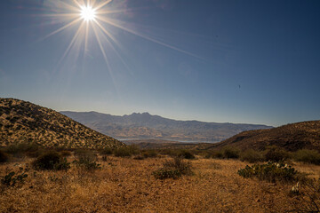 The sun over the Arizona desert landscape
